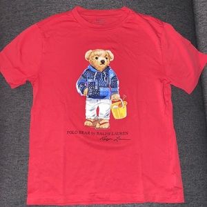 red polo shirt in a medium (10-12)